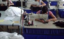 woman in edmonton working on sewing machine